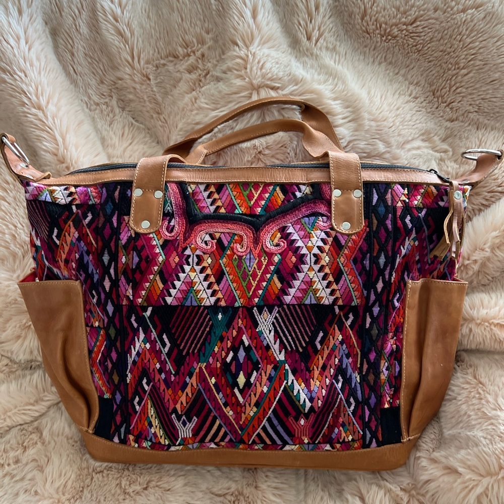 Hiptipico Leather and Embroidered Backpack/Crossbody bag.